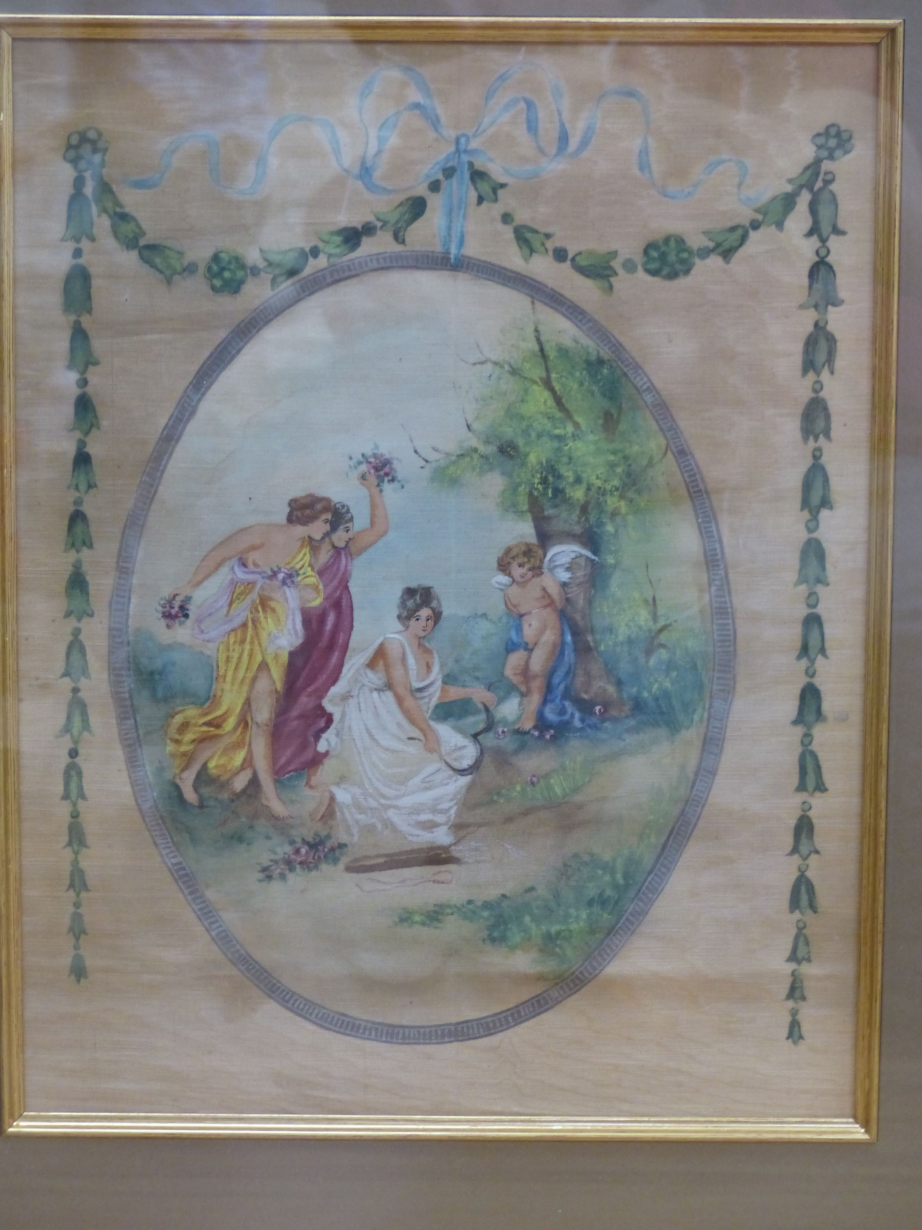 A set of three Edwardian painted silk panels depicting classical muses, 35 x 27cm